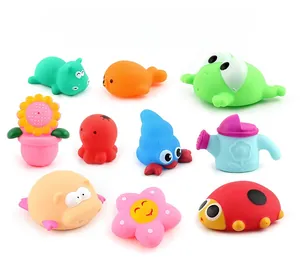 Macro detail of 10 colorful rubber bath toys including crab and frog for infant play