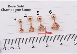 Detail view of 3mm to 6mm rose gold surgical steel earrings with champagne cubic zirconia