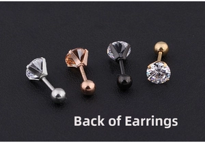 Detail view of medical titanium steel stud earrings with zirconia and back ball screw