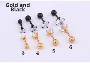 Detail showing 3-6mm black and gold titanium steel stud earrings with zircon stones