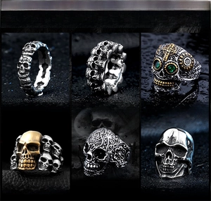 Six punk skull rings in various styles featuring stainless steel and vintage finish