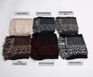 Detail of six bohemian jacquard knitted leg warmers with fringes in various color patterns