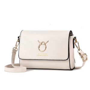 Chic cream white crossbody bag for women with golden stag emblem and metal hardware