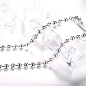 Polished silver titanium steel bead chain for men and women on ice cubes background