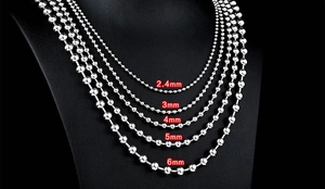 Detail of silver stainless steel bead chains in 2.4mm to 6mm diameters for pendants