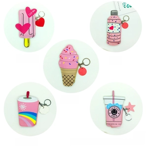 Detail showing five pink leather popsicle and ice cream shaped coin purse bag pendants