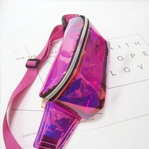 Detail of pink holographic laser waist bag with metallic PVC texture and adjustable strap