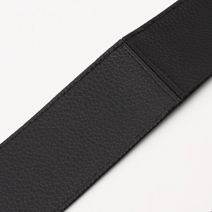 Ceinture taille haute en simili cuir noir avec nœud élégant et texture grainée premium