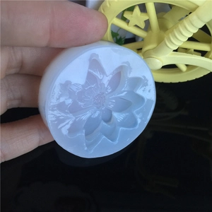 Detailed translucent white silicone mold featuring a sunflower and bee motif design