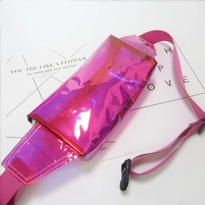 Detailed top view of holographic pink PVC waist bag with black buckle on poetry background