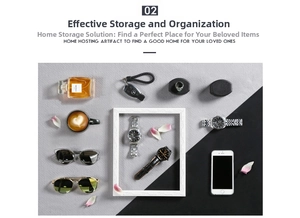 Flat lay of a white jewelry display frame with watches, perfumes, and luxury accessories