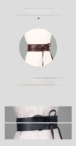 Détail d'une ceinture obi faite main montrant la texture litchi et les coutures précises