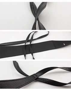 Détails macro de la ceinture en cuir PU noir montrant le grain et les coutures fines