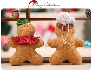 Detailed view of plush gingerbread man Christmas ornaments with soft Sherpa fleece texture