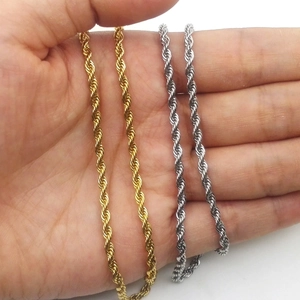 Detail of twisted rope chains in gold and silver finish made of durable stainless steel