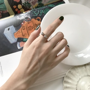 Minimalist S925 sterling silver open ring with double silver beads shown on finger