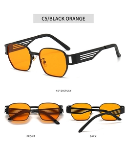 Detailed view of punk metal sunglasses with orange lenses and hollow temple design