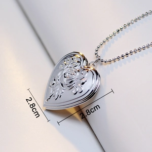 Polished silver heart locket necklace with rose relief and 2.8cm size mark