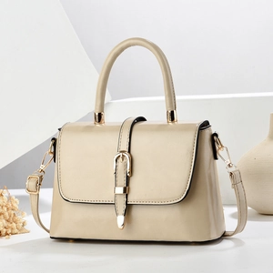 Elegant champagne PU leather crossbody handbag with gold buckle and top handle