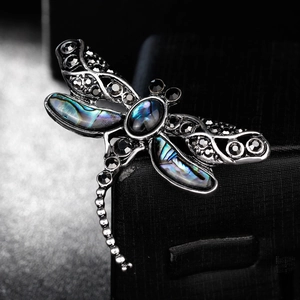 Vintage dragonfly brooch with abalone shell wings and black crystals in dark metal finish