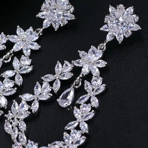 Macro view showing intricate details of Marquise-cut cubic zirconia floral earrings