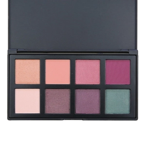 Top view of 8-color matte and shimmer eyeshadow palette with earthy and metallic tones