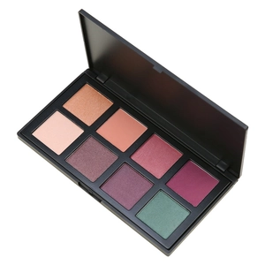 Top view of 8-color matte and shimmer eyeshadow palette with earthy and berry tones