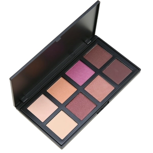 Detailed macro view of 8-color matte and shimmer eyeshadow palette in a black square case