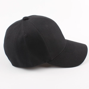 Minimalist black cotton baseball cap with twill texture for sun protection on white background