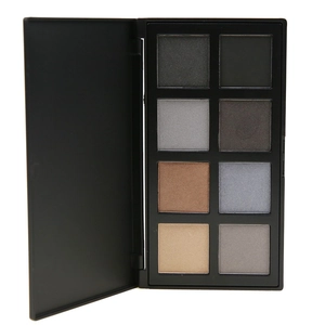 Detailed macro view of 8-color matte and shimmer earth tone eyeshadow palette in black case