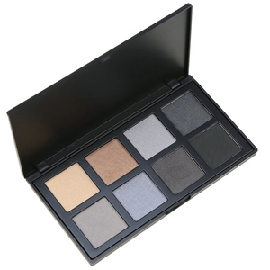Macro shot of 8-color matte and shimmer eyeshadow palette with neutral earth tones
