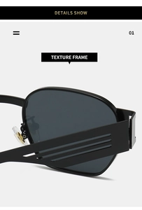Close-up of retro punk metal sunglasses with wide textured temples and hollowed out lines