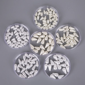 Set of cream teardrop ABS imitation pearls in six round cases for DIY jewelry and hair accessories