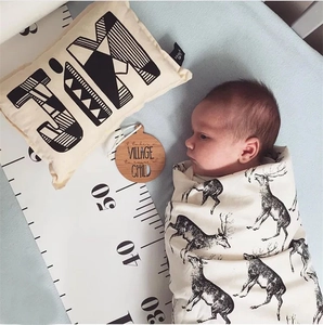 Baby swaddle blanket set with deer pattern, wooden milestone disc and height measurement ruler