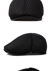 Detail view of black mesh flat cap showing breathable fabric texture and structured brim