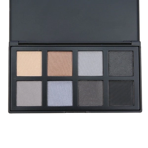 Close-up of 8-color matte and shimmer eyeshadow palette in neutral earth tones