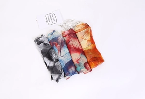 Detailed view of four sheer scarves with delicate leaf vein patterns in various colors