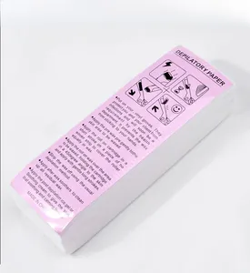 Detail showing high-capacity non-woven depilatory paper with English instruction sheet
