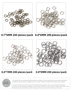 Macro detail of various sizes of metal open jump rings in four metallic finishes for DIY