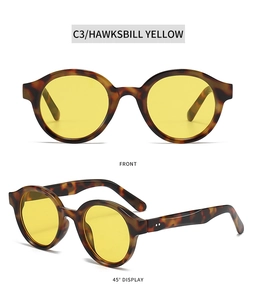 Front and side view of oval tortoiseshell sunglasses with vibrant yellow lenses