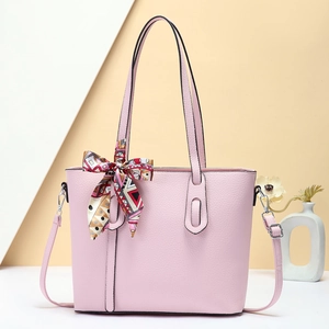 Pink lychee leather tote bag with geometric silk scarf and adjustable strap for women