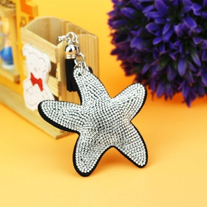 Starfish keychain with sparkling rhinestones and black leather tassel charm for bags