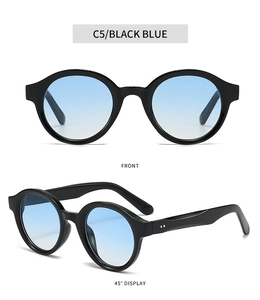 Detail view of oval sunglasses featuring C5 black frame, blue gradient lenses and double rivets