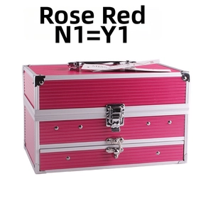 Maletín de maquillaje rosa con rayas, bordes de aluminio plateado y cierres metálicos