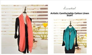 Detail of coral and teal cotton linen scarves with natural breathable fabric texture