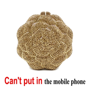 Detailed view of rose-shaped evening clutch with champagne crystals and no phone capacity