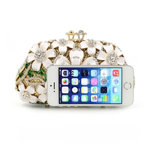 Exquisite gold crystal evening clutch bag with white floral rhinestones and size reference