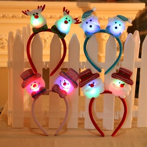 Light-up Christmas headbands with festive reindeer, snowman, and Santa characters