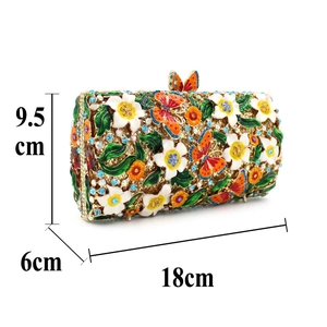 Detail of floral enamel evening clutch with crystals and dimensions 18cm x 9.5cm
