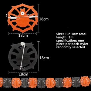 Close-up of 3m Halloween paper garland featuring 18cm black and orange spider cutouts
